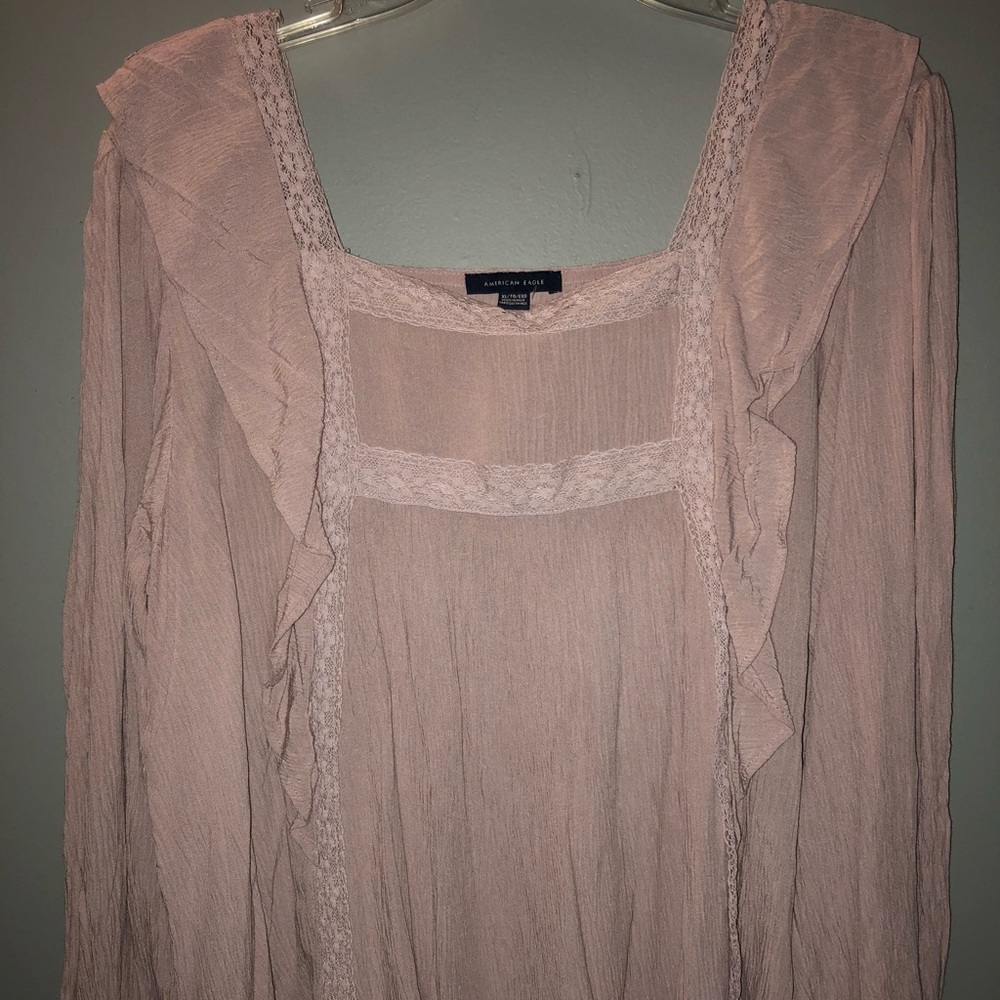 Light pink long sleeved blouse